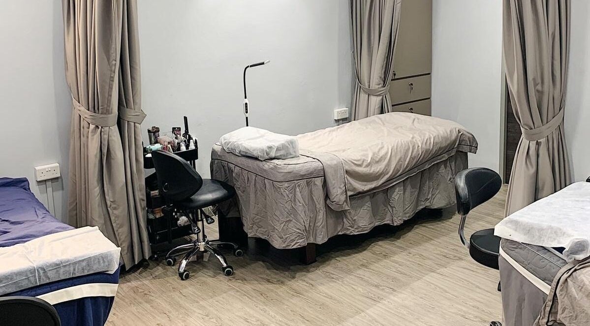 Cozy treatment room at HD Brow Set Beauty Quarters, Singapore, SG, offering privacy and comfort.