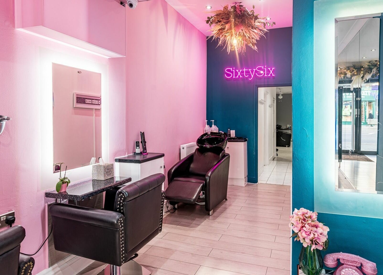 Elegant interior of SixtySix beauty salon in Ilford, England, GB, featuring chic decor and modern furnishings.