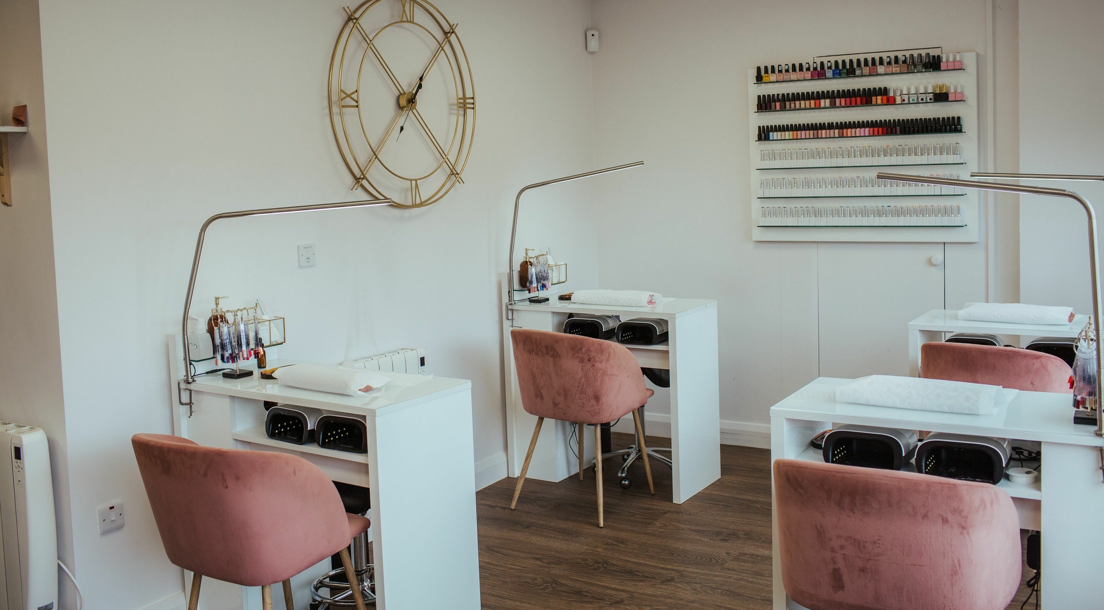 Cozy, stylish interior of No.29 Nail Lounge in Glenageary, IE, featuring chic nail stations and plush seating.
