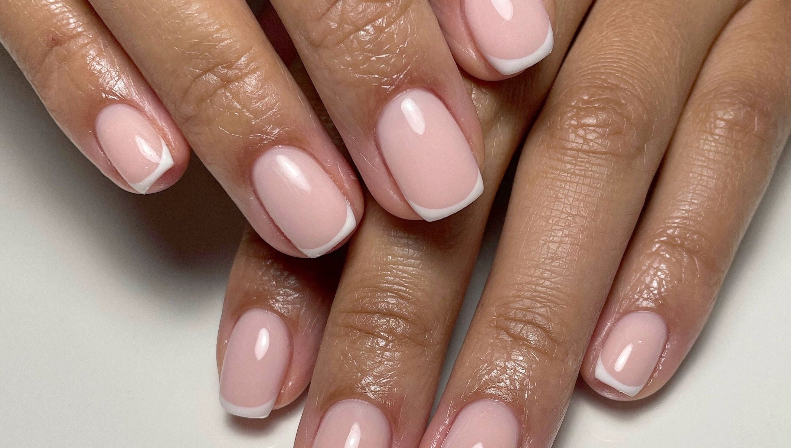 French manicure on nails at JM Nails and Beauty, Birmingham, England, GB.