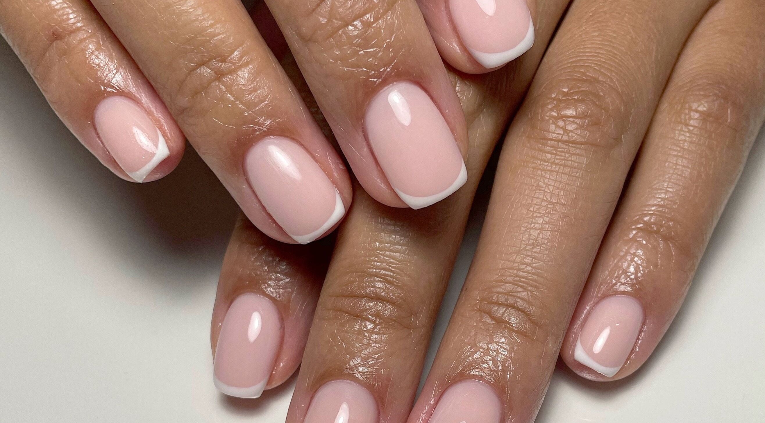 French manicure on nails at JM Nails and Beauty, Birmingham, England, GB.
