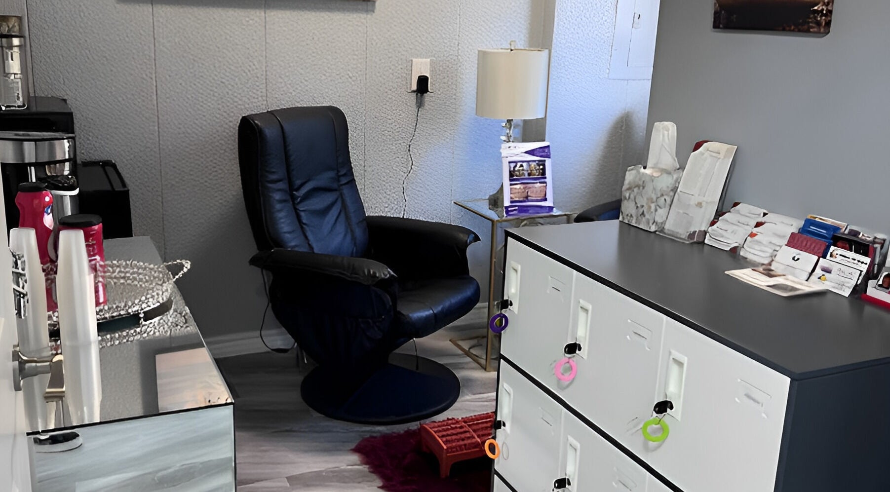 Relaxing lounge at Flawless Spa Retreat of Distinction, Live Oak, Texas, US, with cozy chair and modern decor.