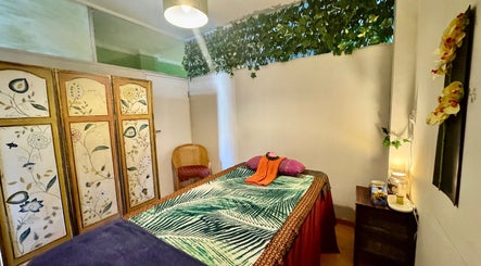 Peaceful massage room at Rabeang Mai Thai Massage Therapy, Cape Town, Western Cape, ZA with calming decor.