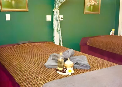Serene massage room at Rabeang Mai Thai Massage Therapy, Cape Town, Western Cape, ZA with prepared massage beds.