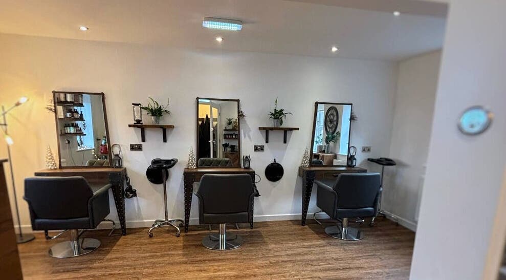 Stylish interior of Dawn Furness at Okra Salon, Bedlington, England, GB, showcasing salon chairs and mirrors.