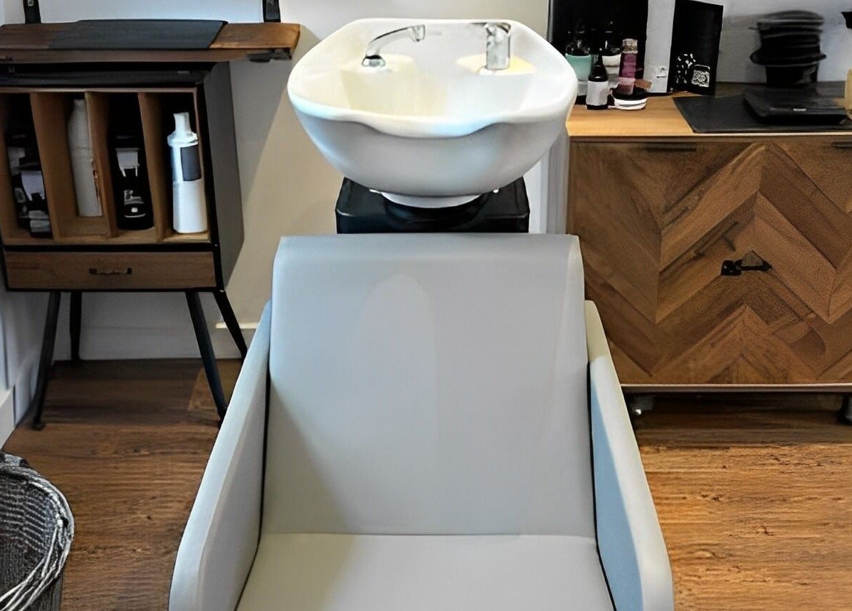 Modern wash station at Dawn Furness at Okra Salon, Bedlington, England, GB, featuring sleek design and chic decor.