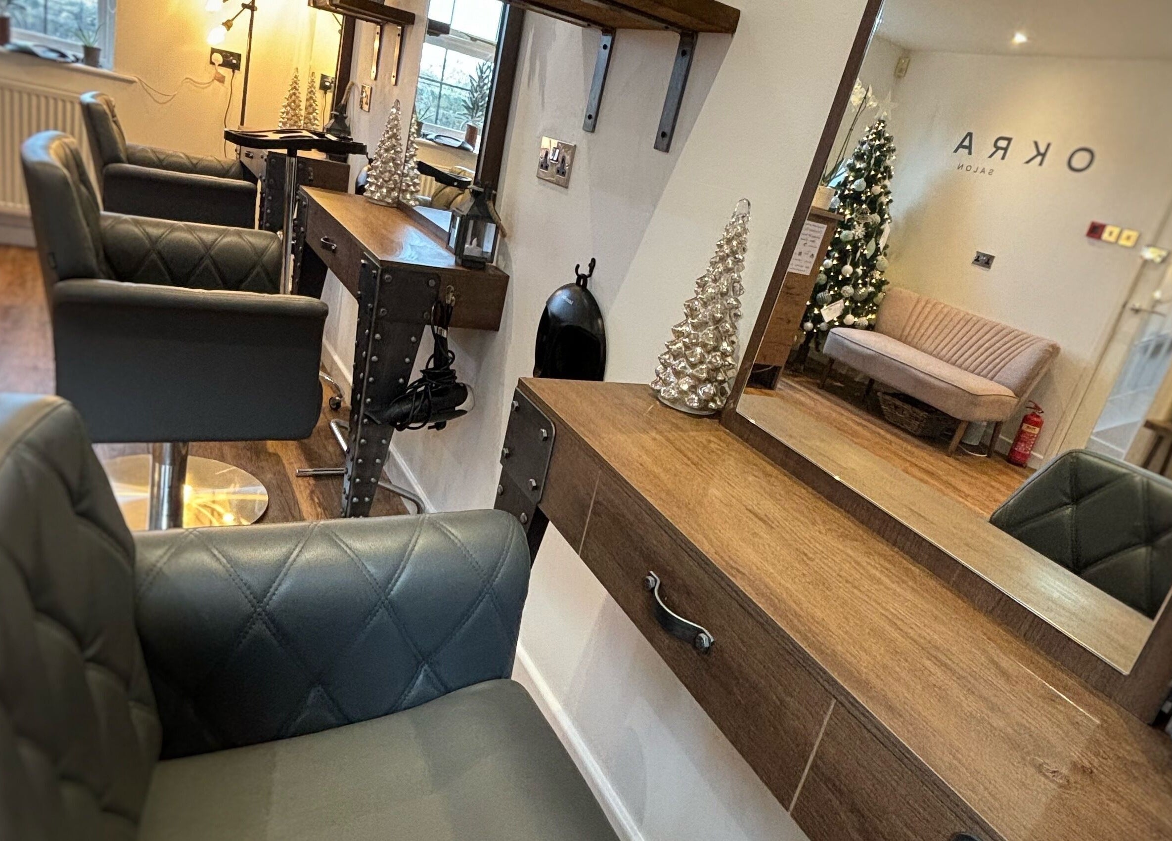 Elegant styling station at Dawn Furness at Okra Salon, Bedlington, England, GB, showcasing festive decor.