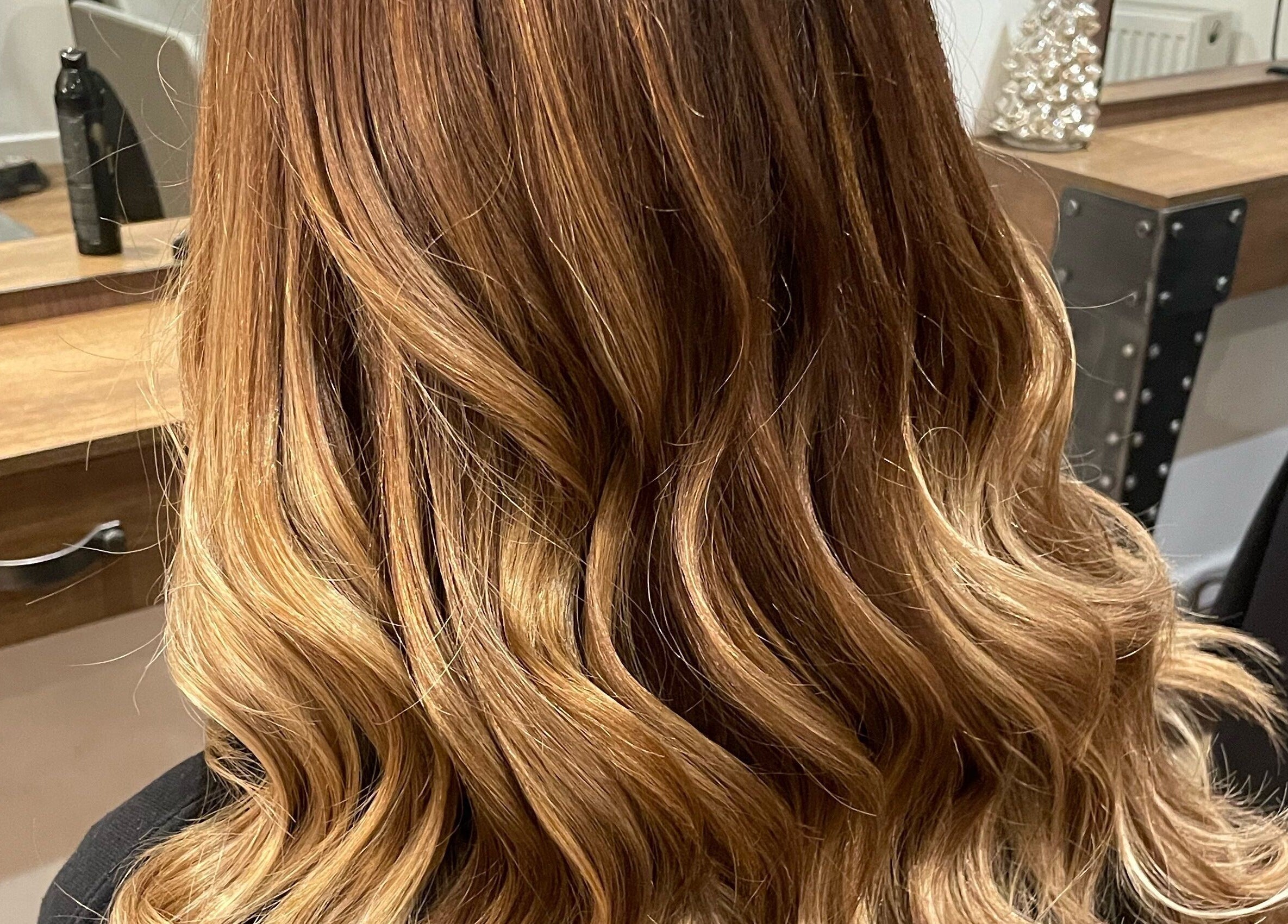 Elegant wavy hairstyle crafted at Dawn Furness at Okra Salon, Bedlington, England, GB.