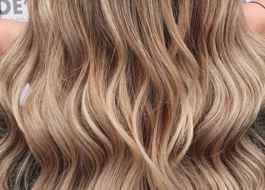 Blonde wavy hairstyle crafted at Chloe Jade Hair, Rogerstone, Newport, GB.