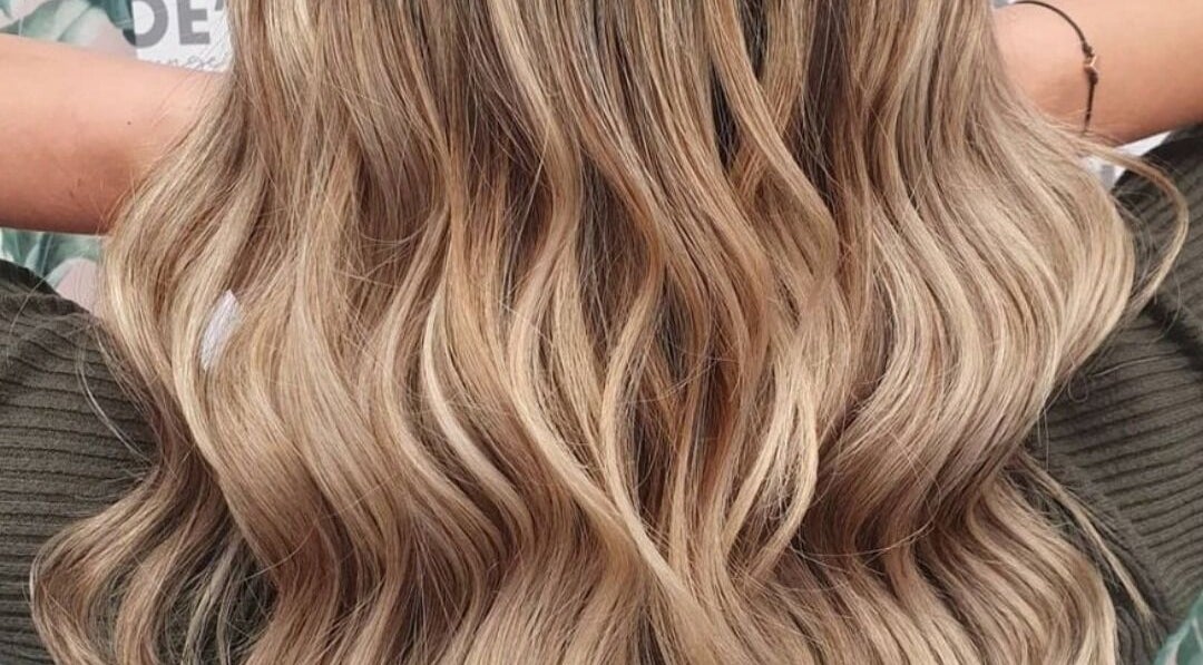 Blonde wavy hairstyle crafted at Chloe Jade Hair, Rogerstone, Newport, GB.