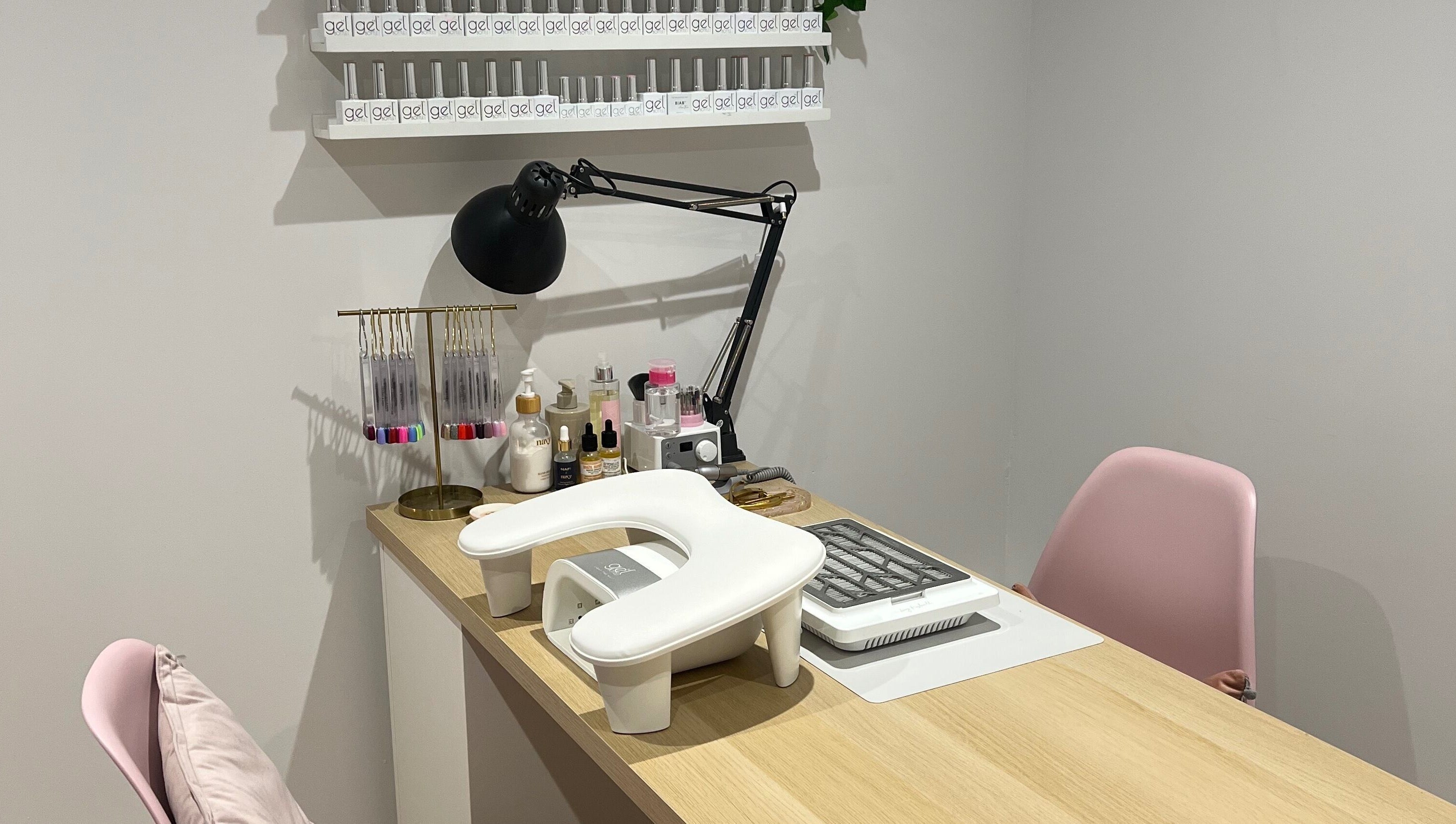 Manicure station at Olivia’s Beauty Studio, Hockley, England, GB with gel colors and tools.