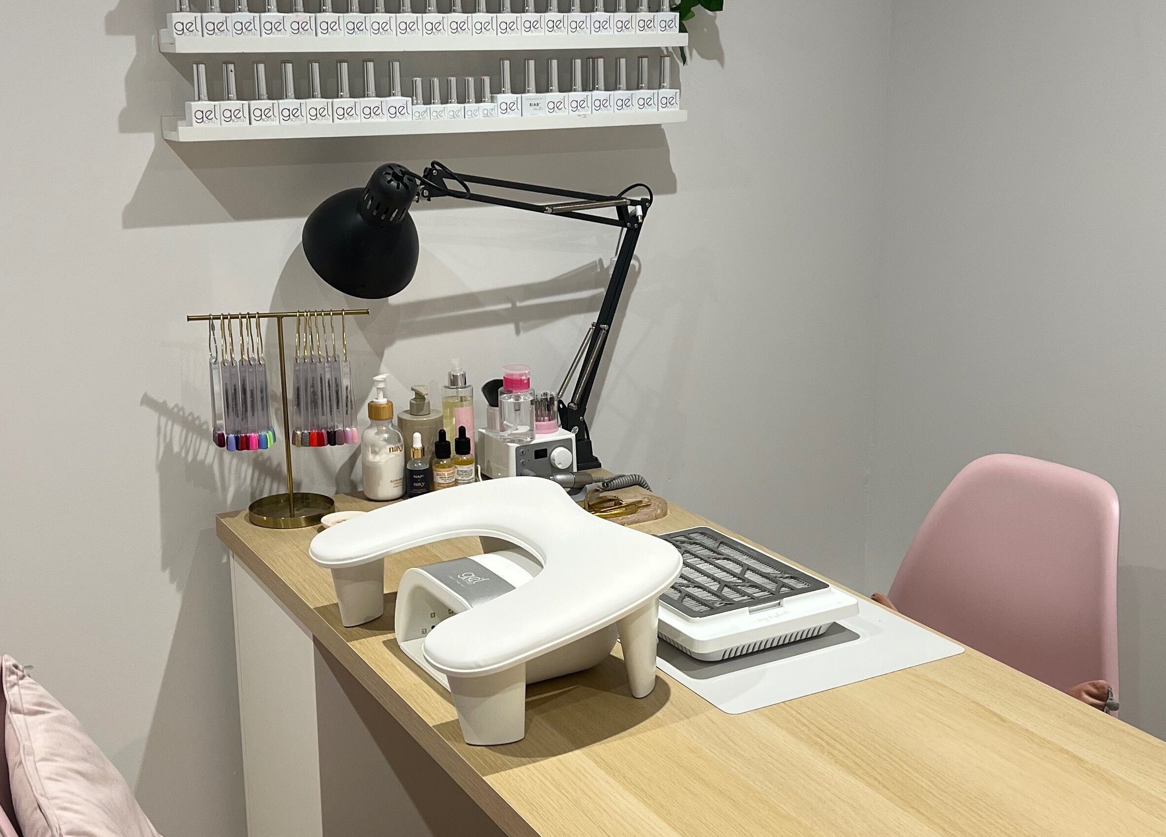 Manicure station at Olivia’s Beauty Studio, Hockley, England, GB with gel colors and tools.
