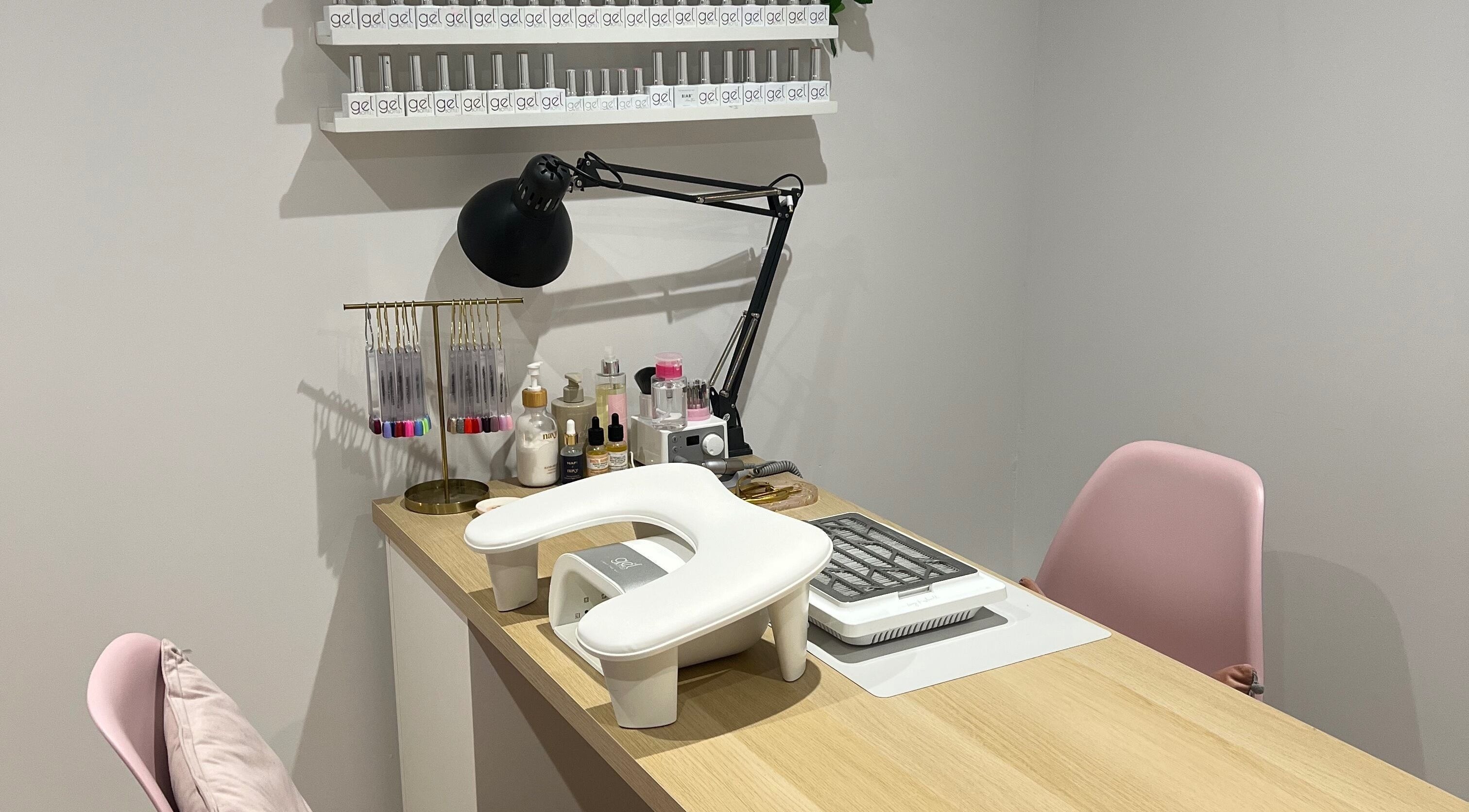 Manicure station at Olivia’s Beauty Studio, Hockley, England, GB with gel colors and tools.