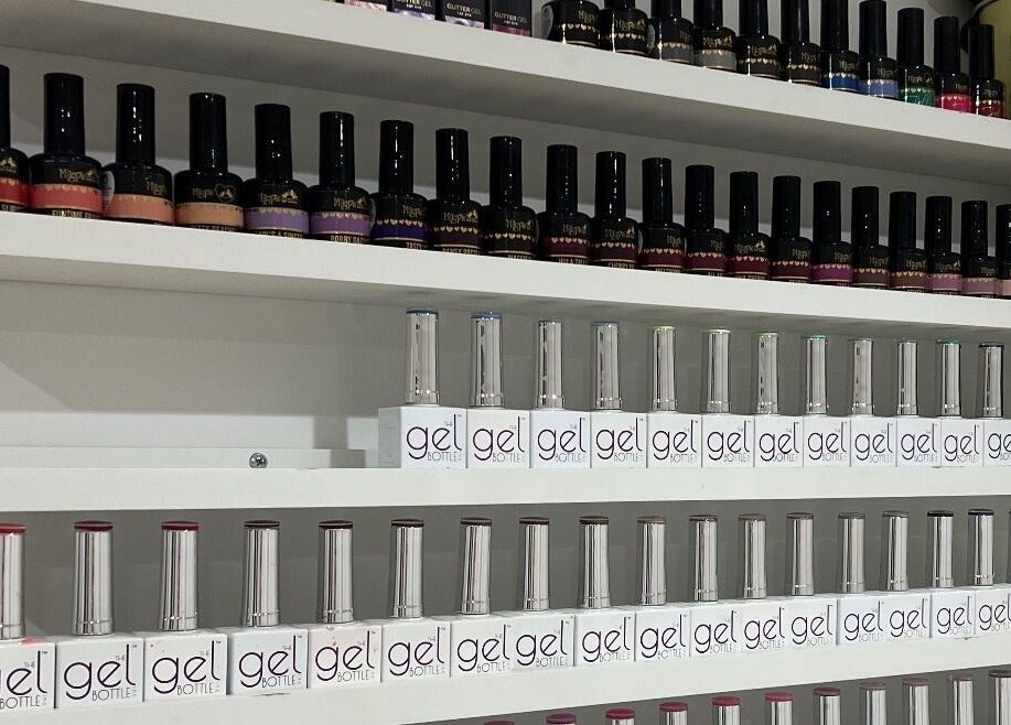 Nail polish display at Olivia’s Beauty Studio in Hockley, England, GB, showcasing vibrant gel colors.
