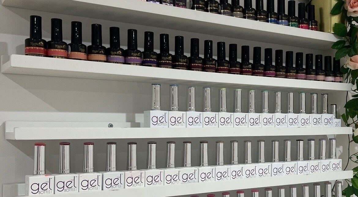 Nail polish display at Olivia’s Beauty Studio in Hockley, England, GB, showcasing vibrant gel colors.