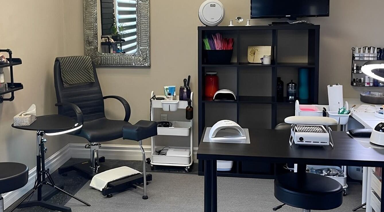 Cozy nail salon at Nails with Love, Red Lake, Ontario, CA showcasing manicure station and modern decor.