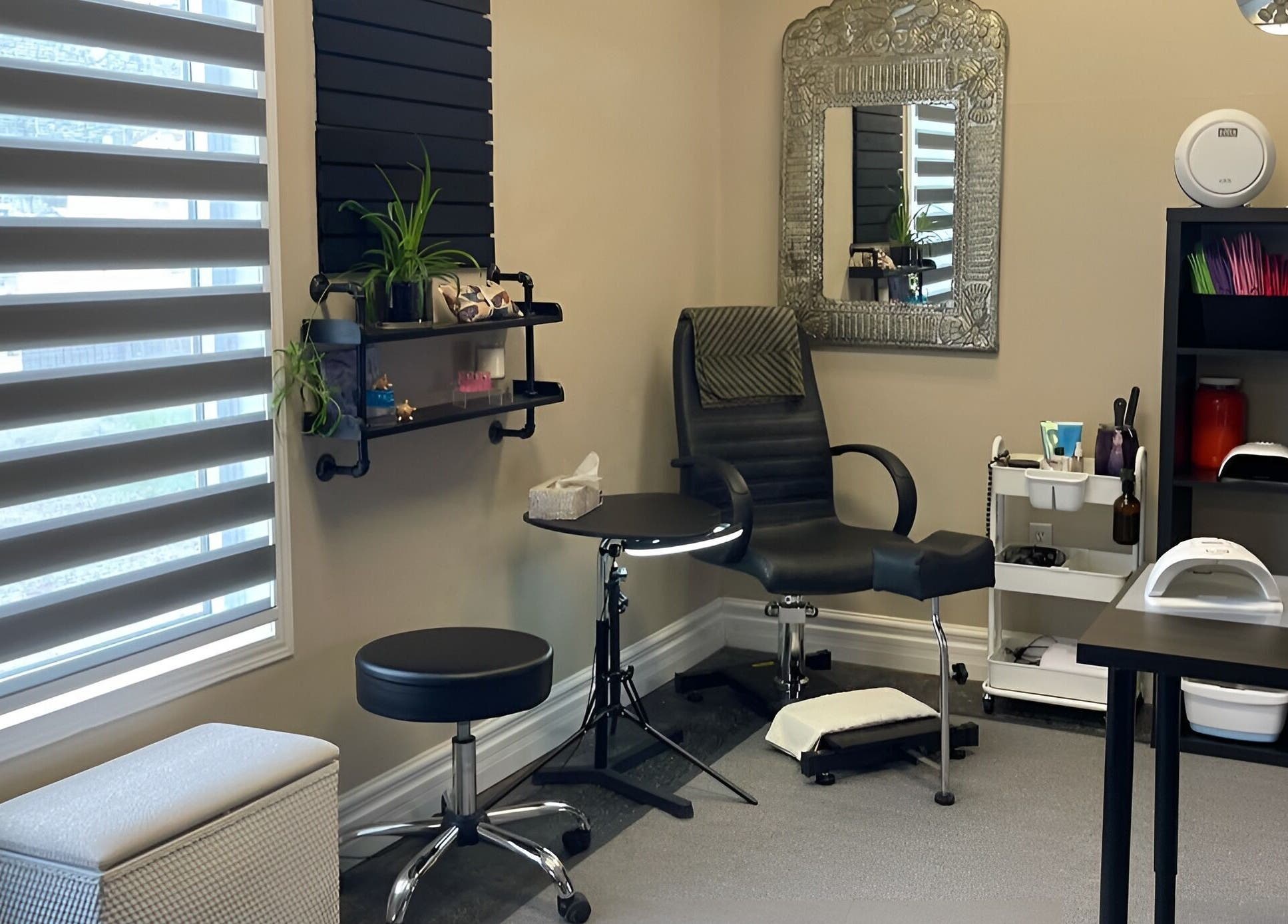 Elegant nail salon setup at Nails with Love in Red Lake, Ontario, CA featuring modern decor and comfy seating.