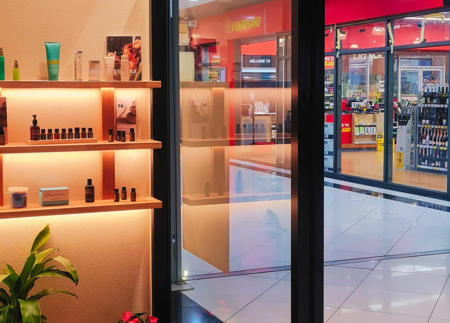 Product display at Tao Massage Mountain High, Melbourne, Victoria, AU. Sleek shelves with wellness items.