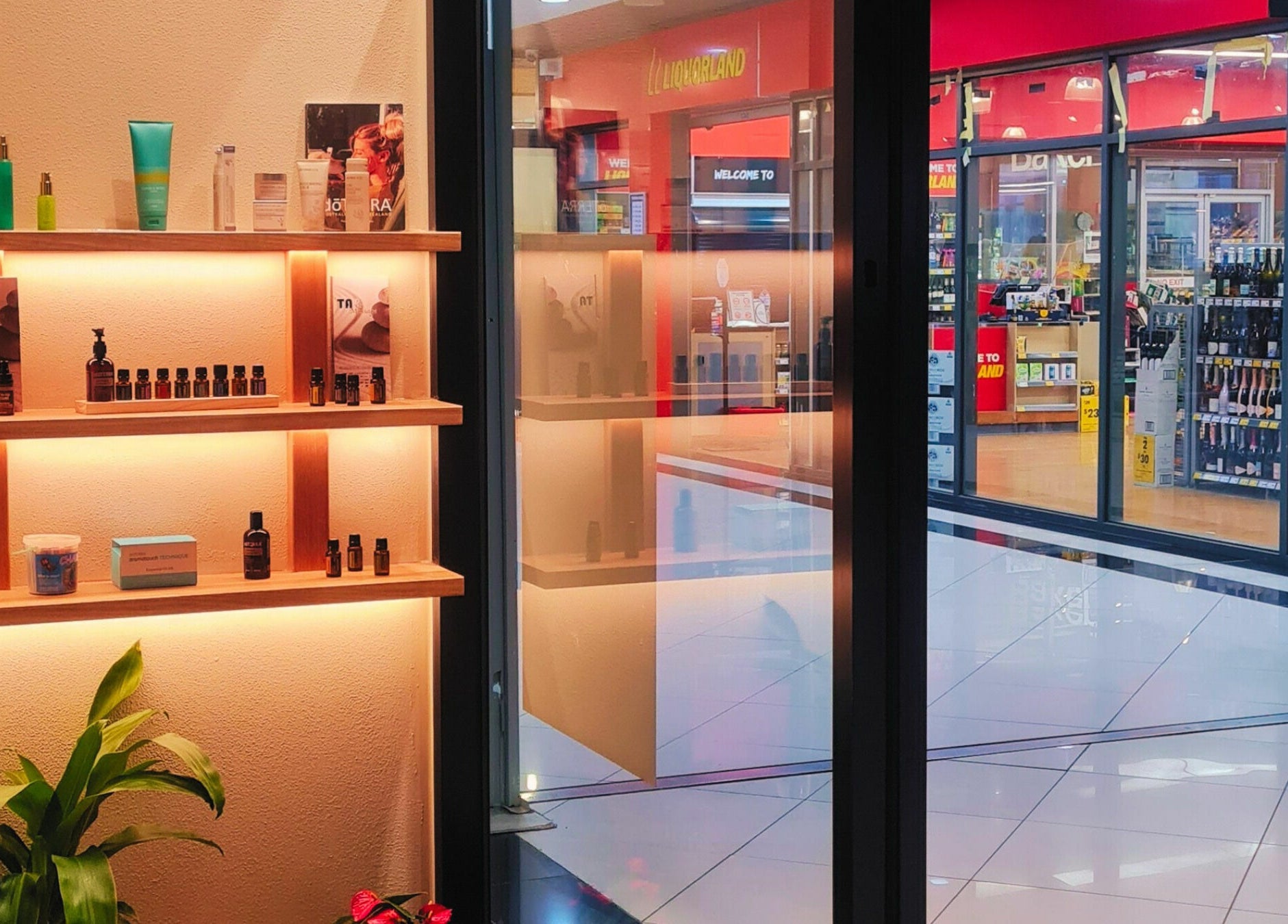 Product display at Tao Massage Mountain High, Melbourne, Victoria, AU. Sleek shelves with wellness items.