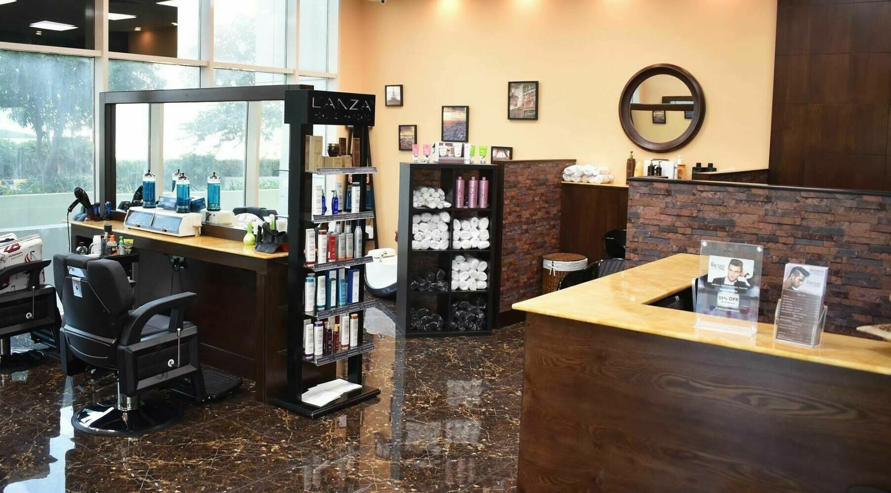 Modern interior of Retro Marina Gents Salon in Abu Dhabi, AE, showcasing sleek barber chairs and product shelves.