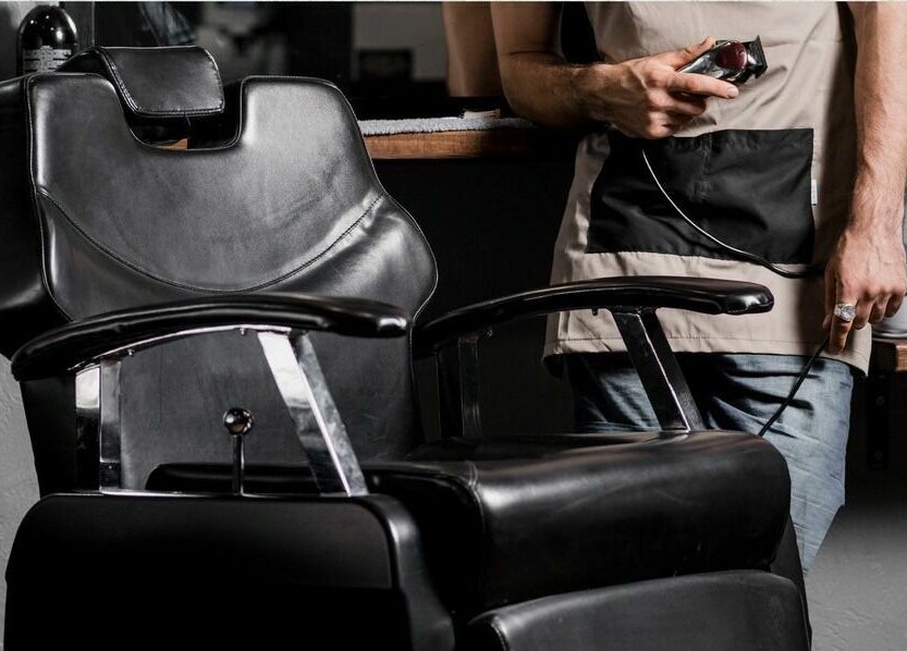 Classic barber chair at Retro Marina Gents Salon, Abu Dhabi, AE, showcasing a stylish grooming experience.