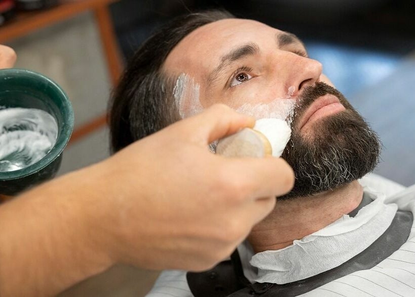 Expert beard grooming at Retro Marina Gents Salon, Abu Dhabi, AE, showcasing professionalism and style.