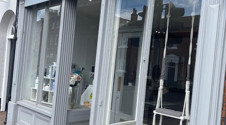 Stylish storefront of Hair With Jess in Burton Upon Trent, England, GB, showcasing elegant design and decor.