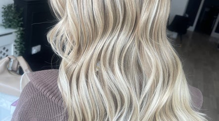 Blonde wavy hairstyle at Hair With Jess, Burton Upon Trent, England, GB.