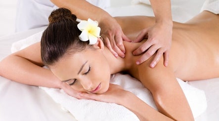 Client enjoying massage at Body Therapy Massage and Facial Spa in Lauderdale-By-The-Sea, Florida, US.