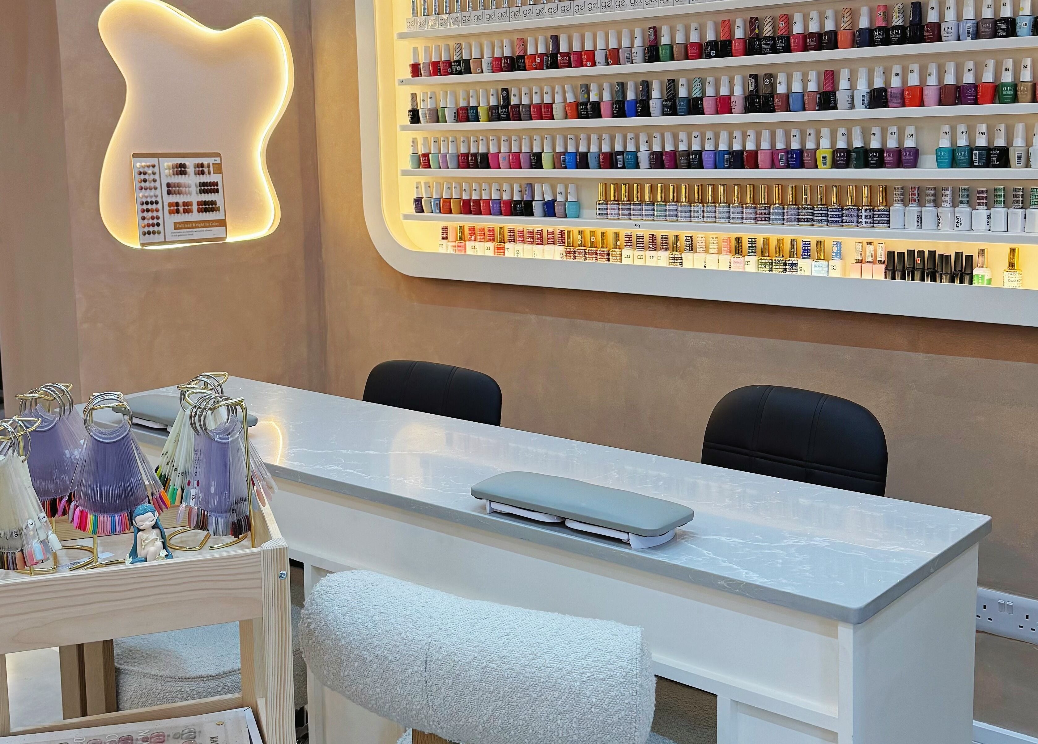 Modern nail polish display at Natural Nails, London, England, GB enhancing the salon's stylish ambiance.