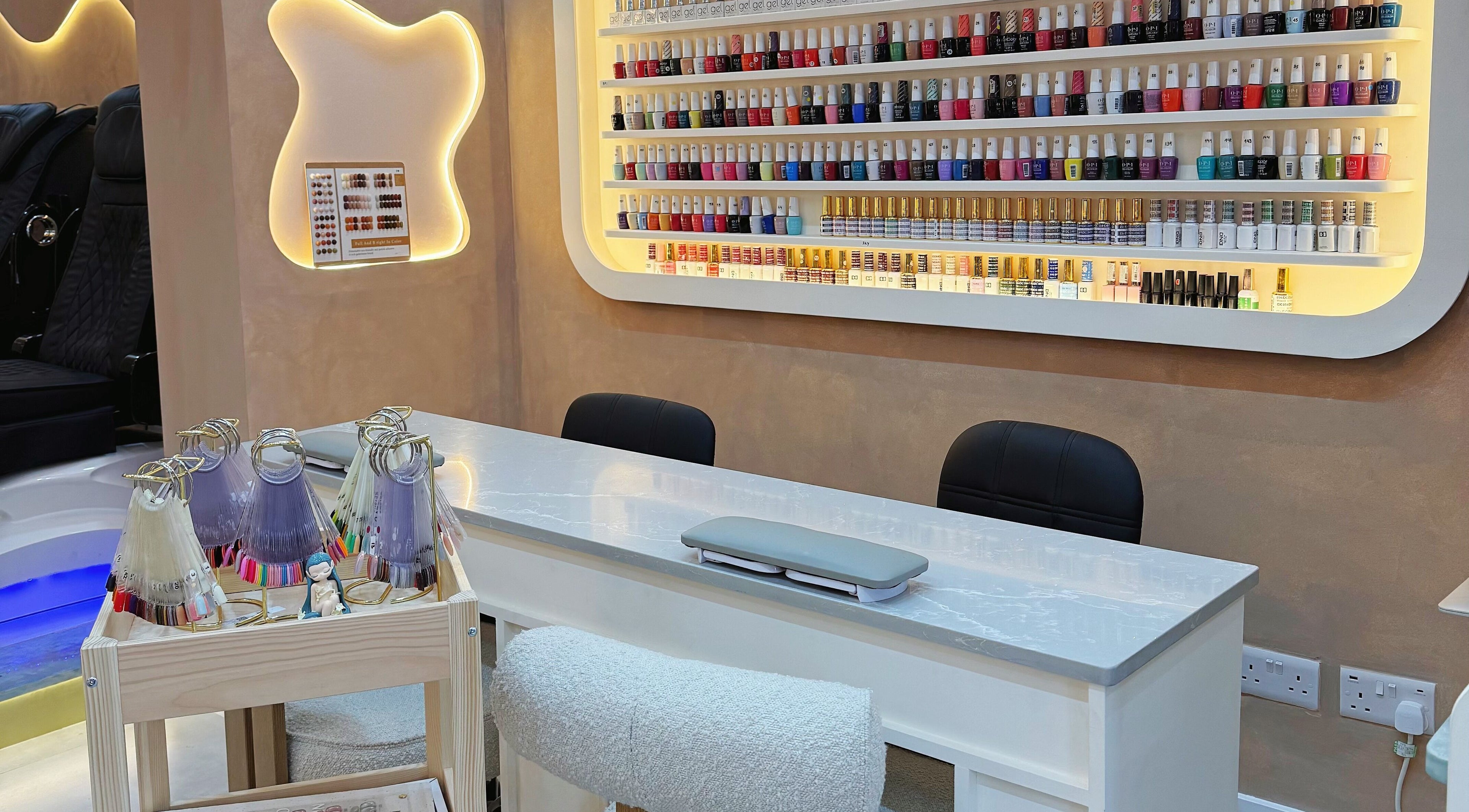 Modern nail polish display at Natural Nails, London, England, GB enhancing the salon's stylish ambiance.
