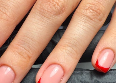 Stylish red-tipped manicure at Polished Nails, Portsmouth, England, GB.