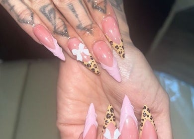 Elegant claw nails with pink and leopard print design at Polished Nails, Portsmouth, England, GB.