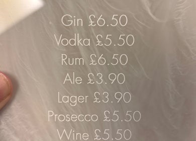 Drink menu at SOMA Skin Clinic, Kidderminster, England, GB featuring gin, vodka, rum, ale, lager, and prosecco.
