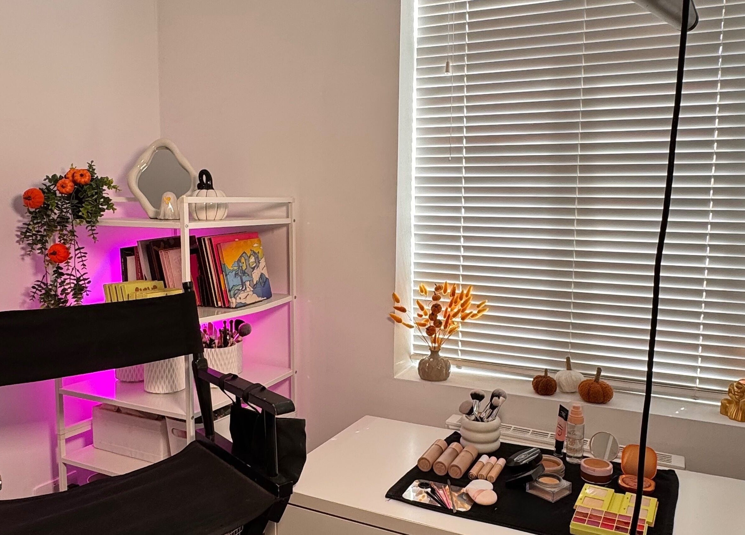 Elegant makeup station at Hmake, Stockport, England, GB featuring cosmetics and decor on a cozy desk.