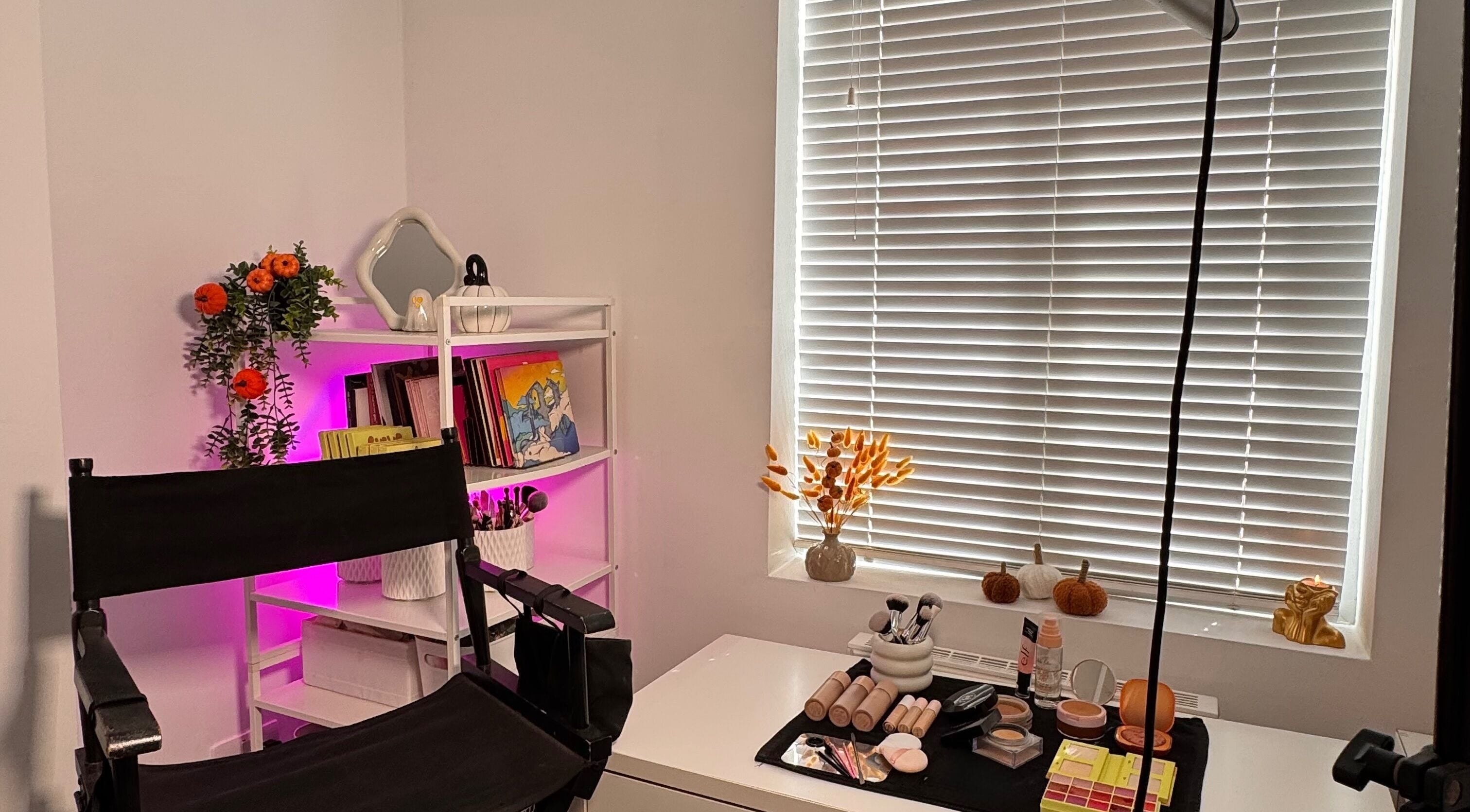 Elegant makeup station at Hmake, Stockport, England, GB featuring cosmetics and decor on a cozy desk.