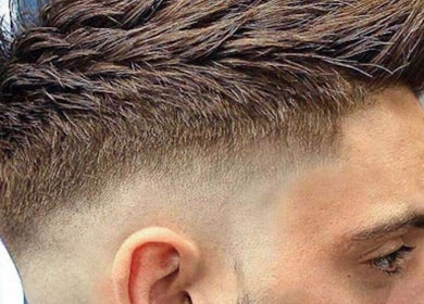 Close-up of a stylish men's fade haircut at The Salon, Wigan, GB.