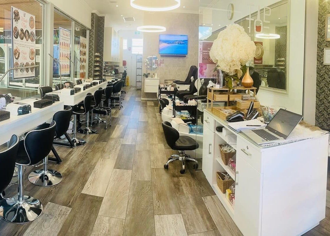 Inside view of Tip Toe Nail Salon - Dickson, showcasing modern decor and seating in Dickson, Australian Capital Territory, AU.