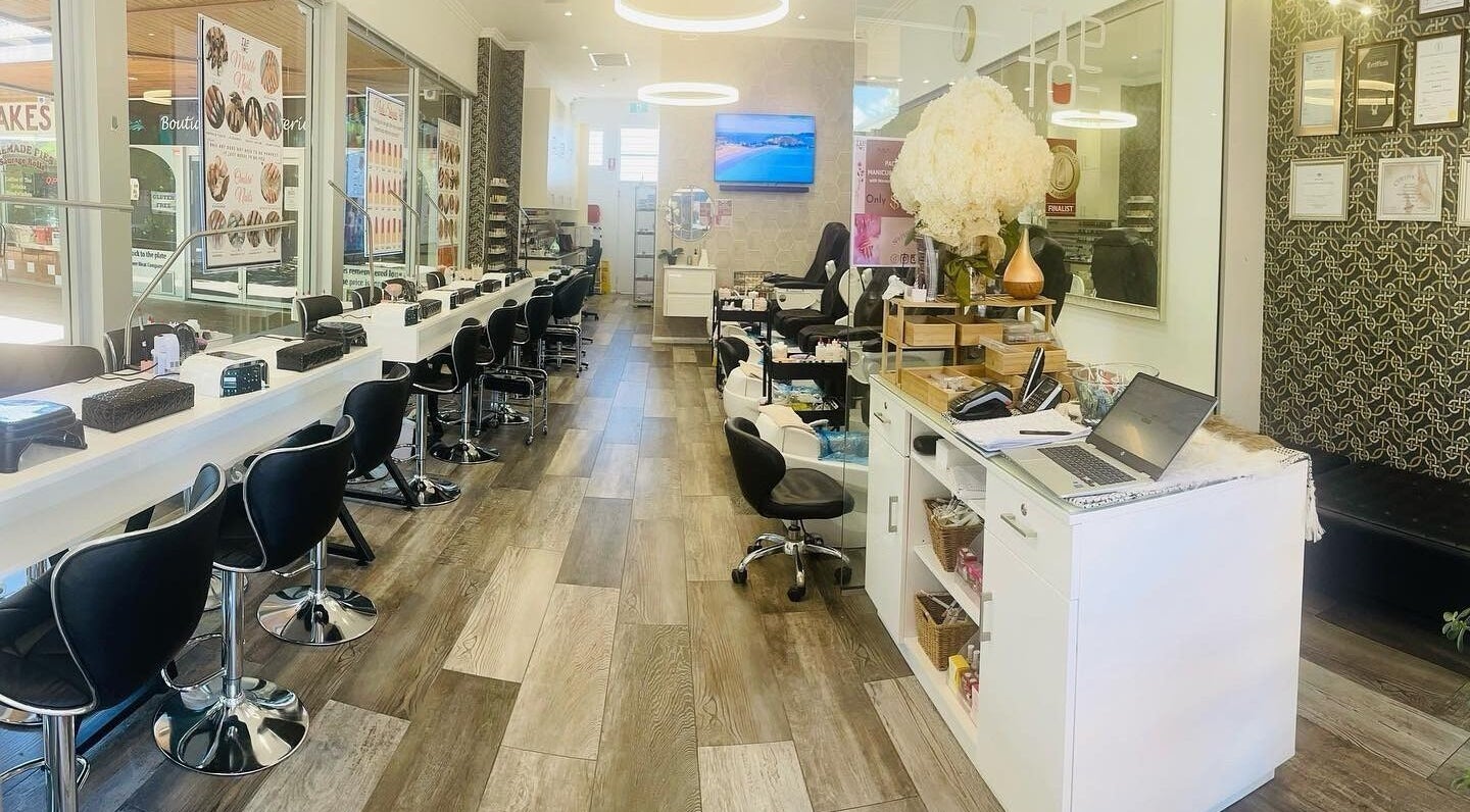 Inside view of Tip Toe Nail Salon - Dickson, showcasing modern decor and seating in Dickson, Australian Capital Territory, AU.