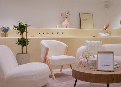Elegant seating area at Amme, Central, Hong Kong Island, HK, featuring plush chairs and chic decor.