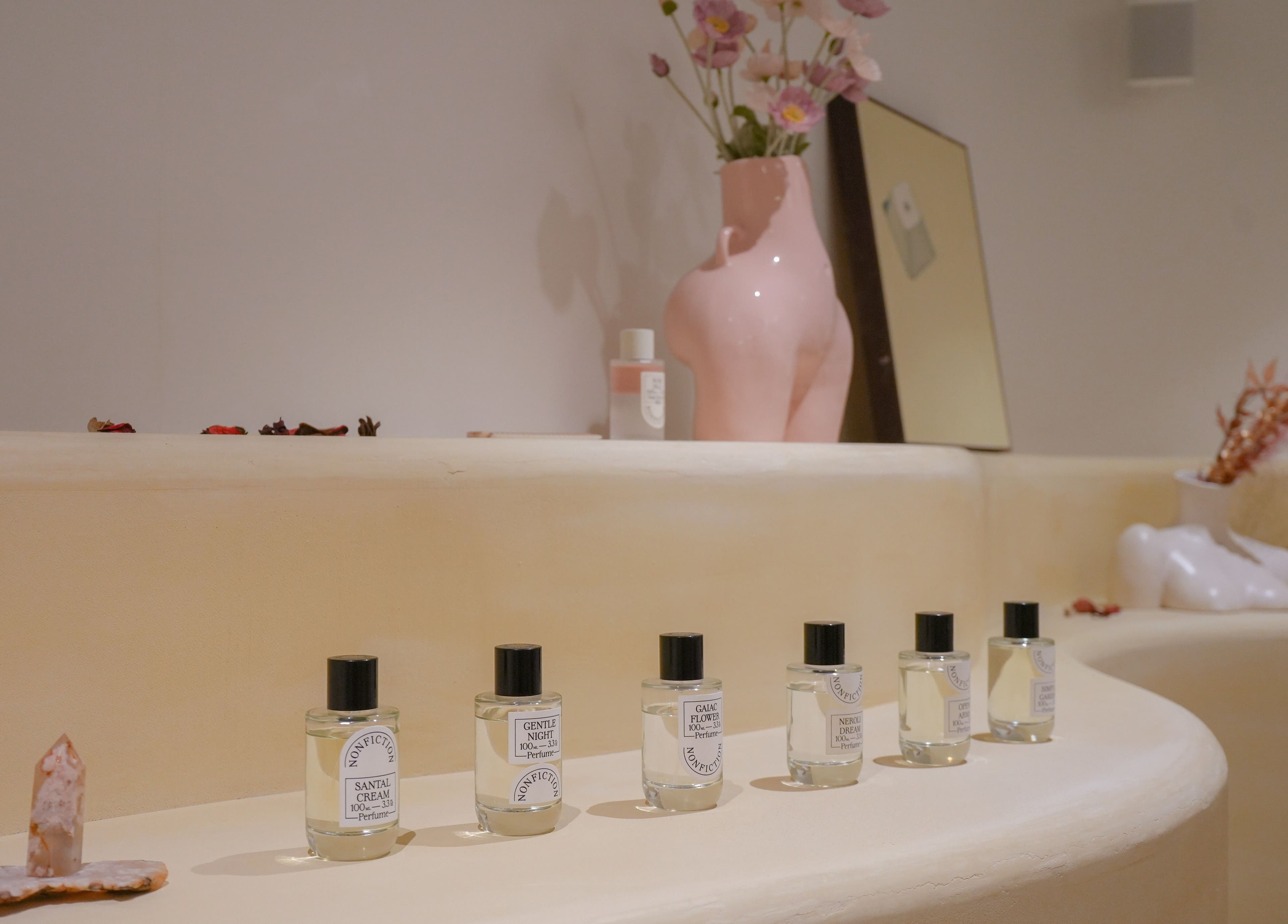 Amme's elegant perfume display in Central, Hong Kong Island, HK showcases curated fragrances in a minimalist setting.