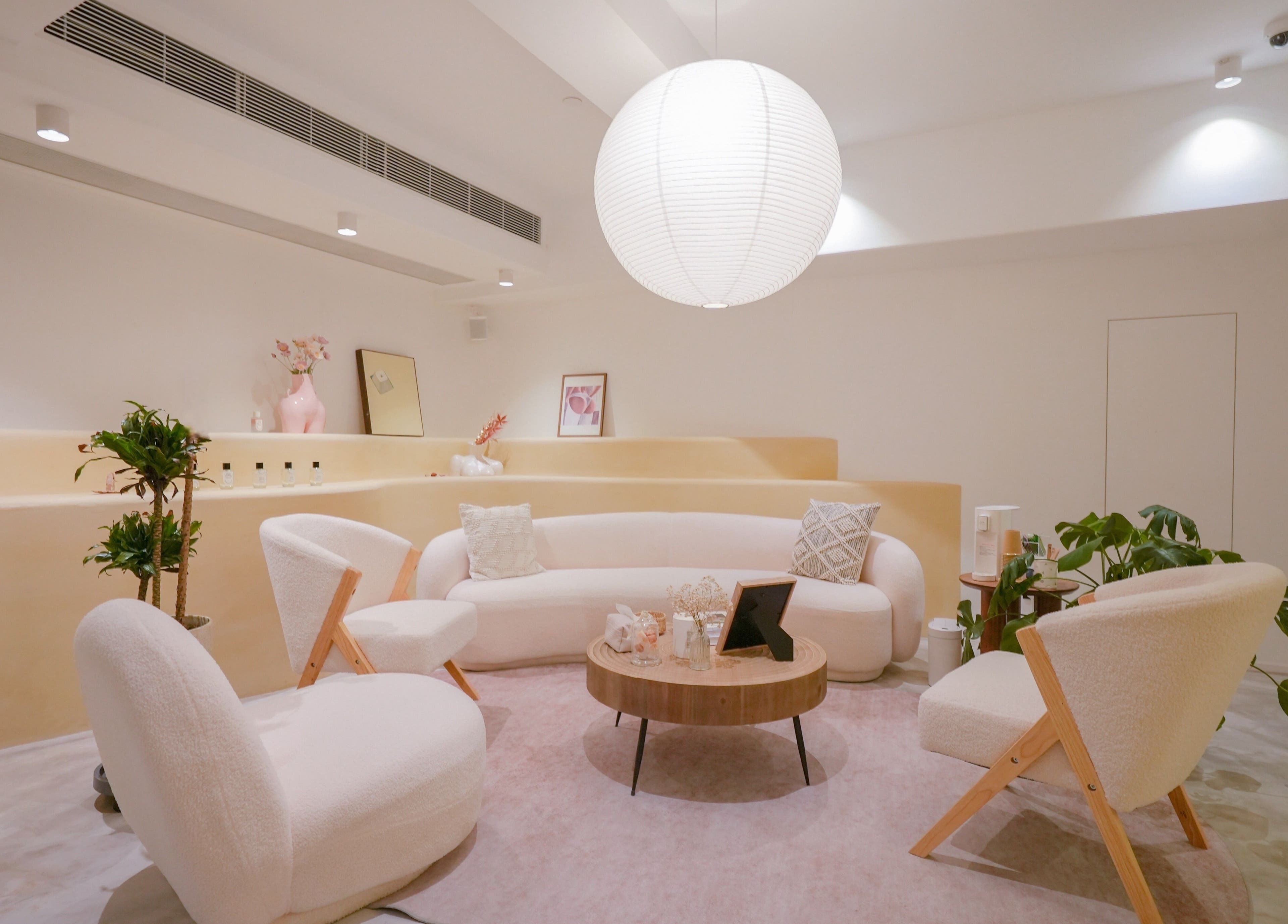 Elegant waiting area at Amme, Central, Hong Kong Island, HK with minimalist decor and comfortable seating.