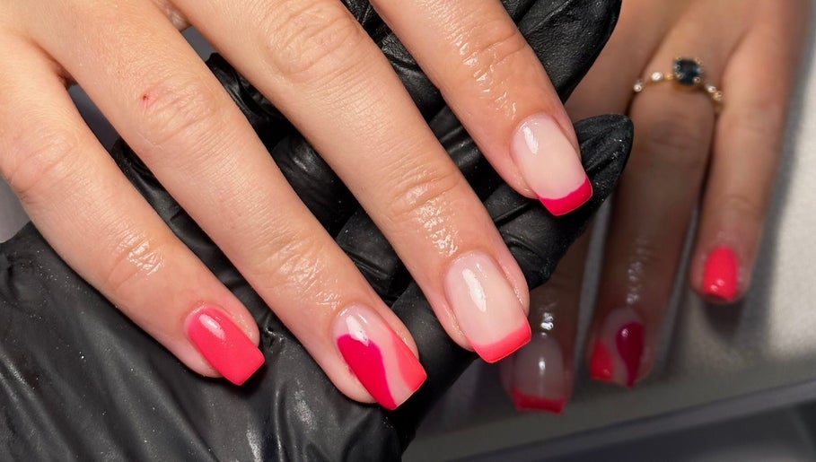 Bright pink and red manicure at Nails by Molly, located in Falkirk, Scotland, GB.
