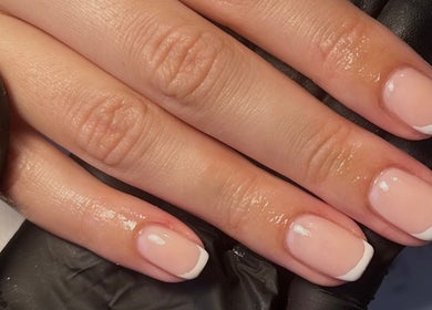 Elegant French manicure at Nails by Molly, Falkirk, Scotland, GB showcasing perfect nail artistry.