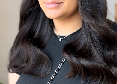 Glossy hair extensions from Ebony Vallender Hair and Extensions, Portsmouth, England, GB adding volume and shine.
