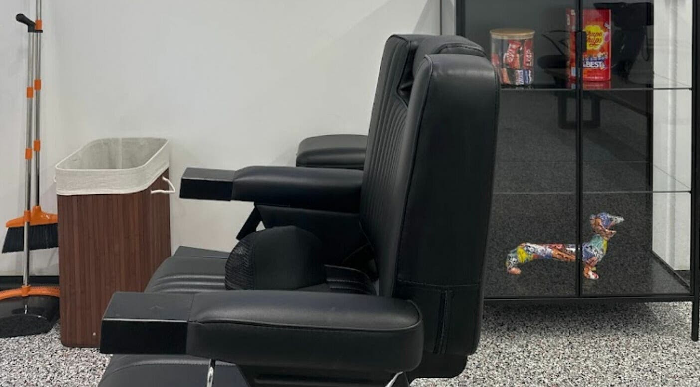 Elegant black salon chairs at Superior 8, Smeaton Grange, New South Wales, AU showcasing modern design.