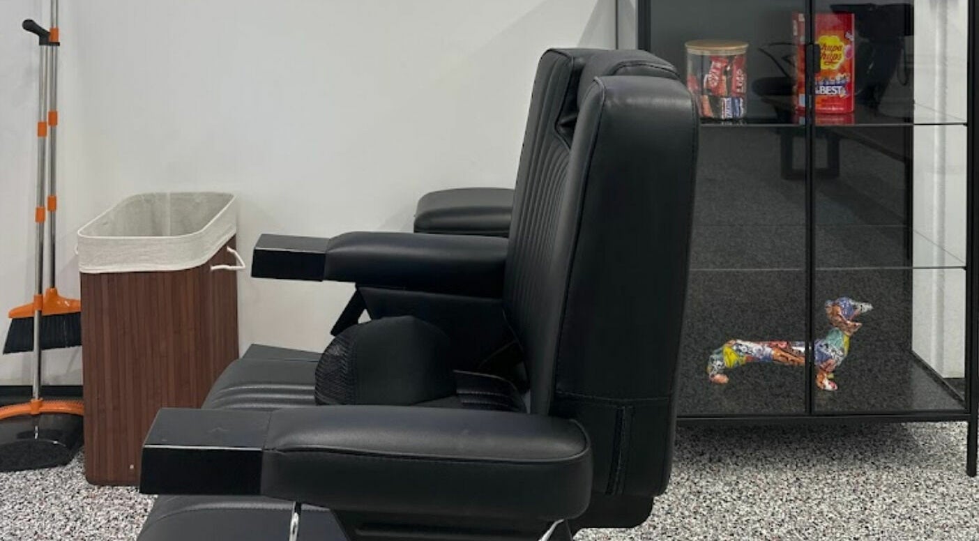 Elegant black salon chairs at Superior 8, Smeaton Grange, New South Wales, AU showcasing modern design.