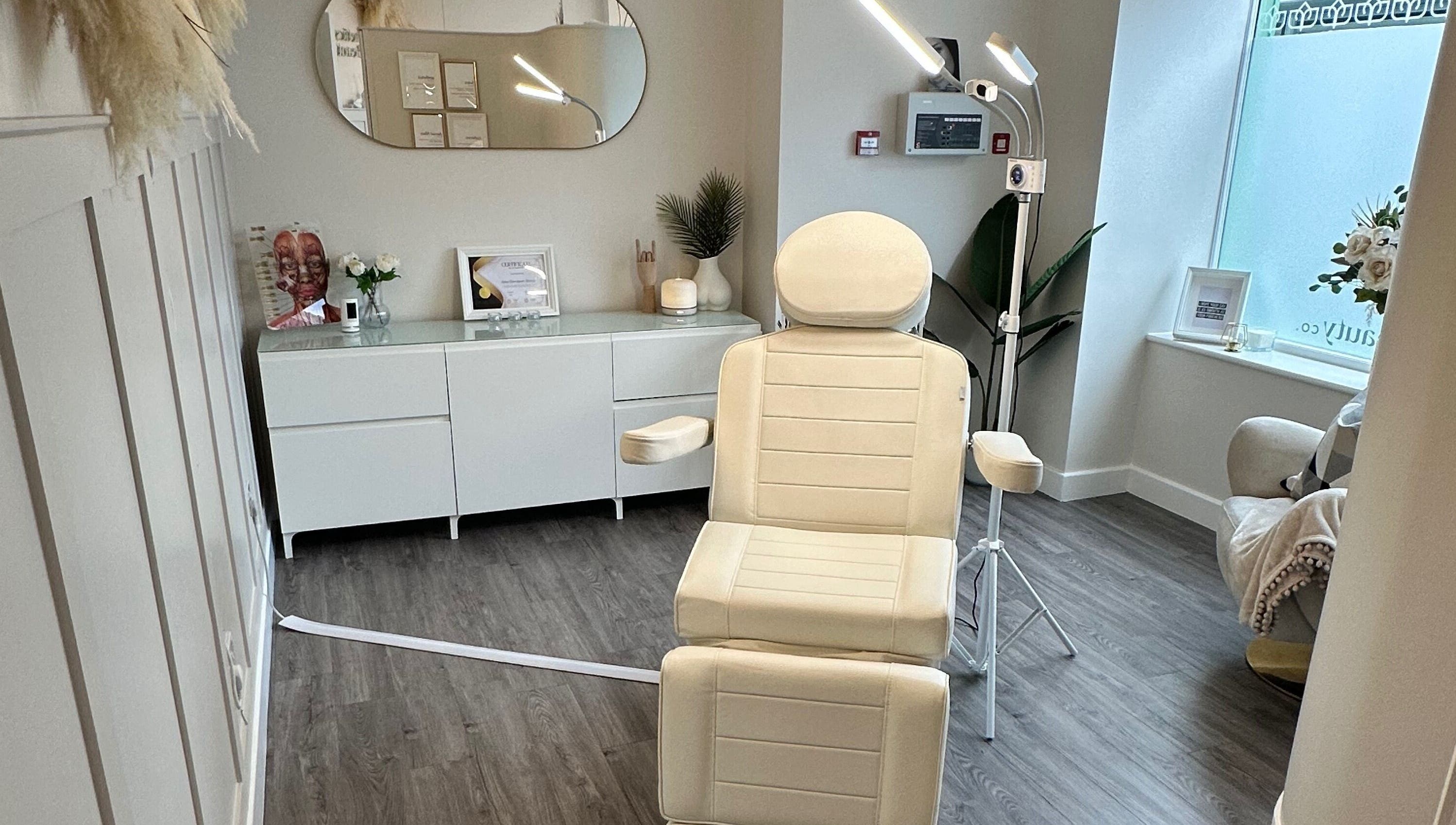 Luxury treatment room at The Aesthetics and Beauty Co - Ilkeston, Ilkeston, England, GB. Features elegant decor.