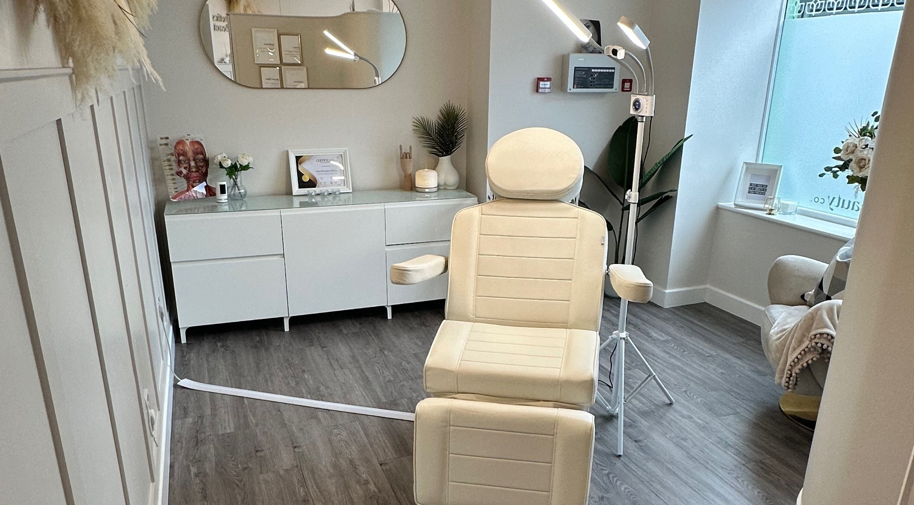 Luxury treatment room at The Aesthetics and Beauty Co - Ilkeston, Ilkeston, England, GB. Features elegant decor.
