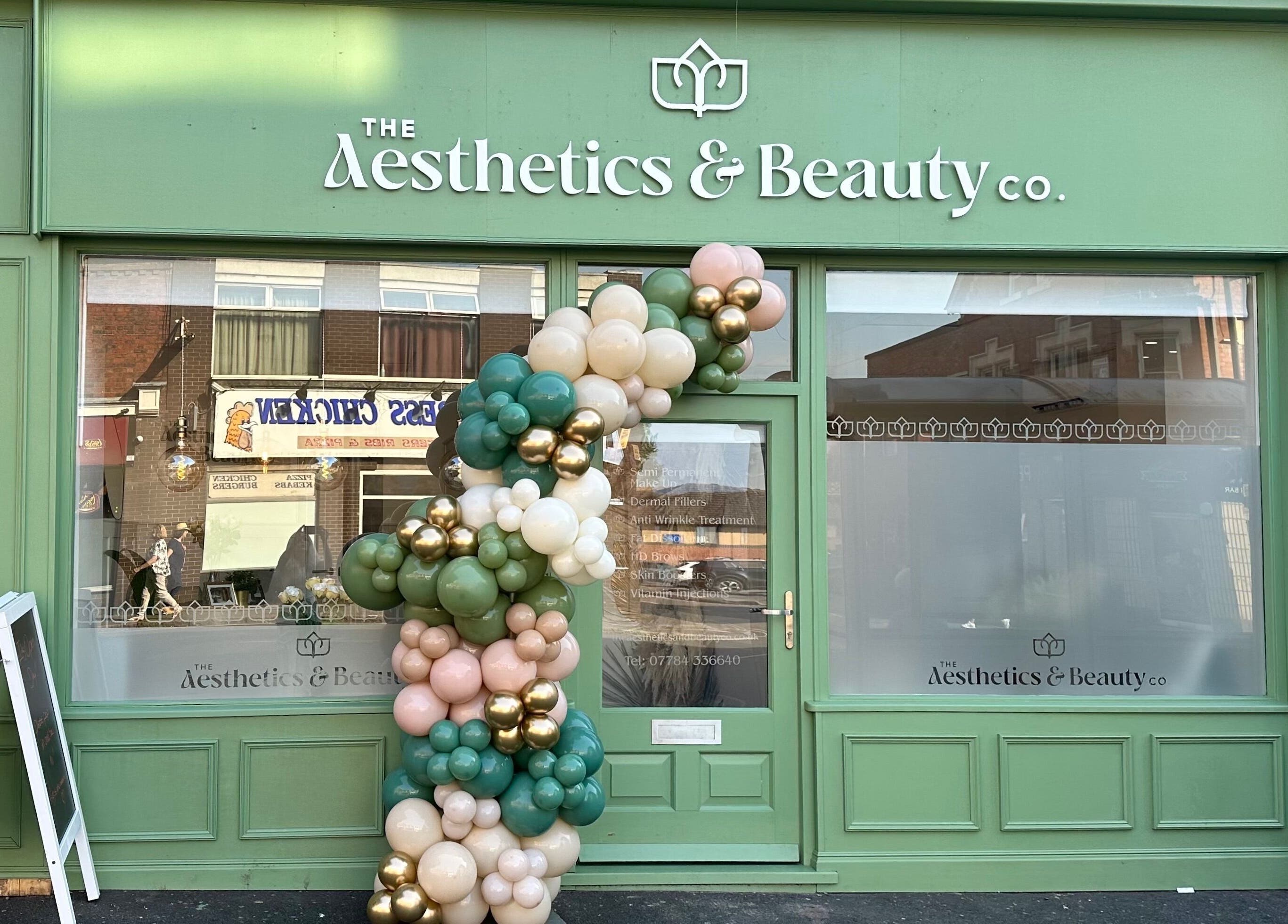The Aesthetics and Beauty Co - Ilkeston frontage with balloon decor, Ilkeston, England, GB.